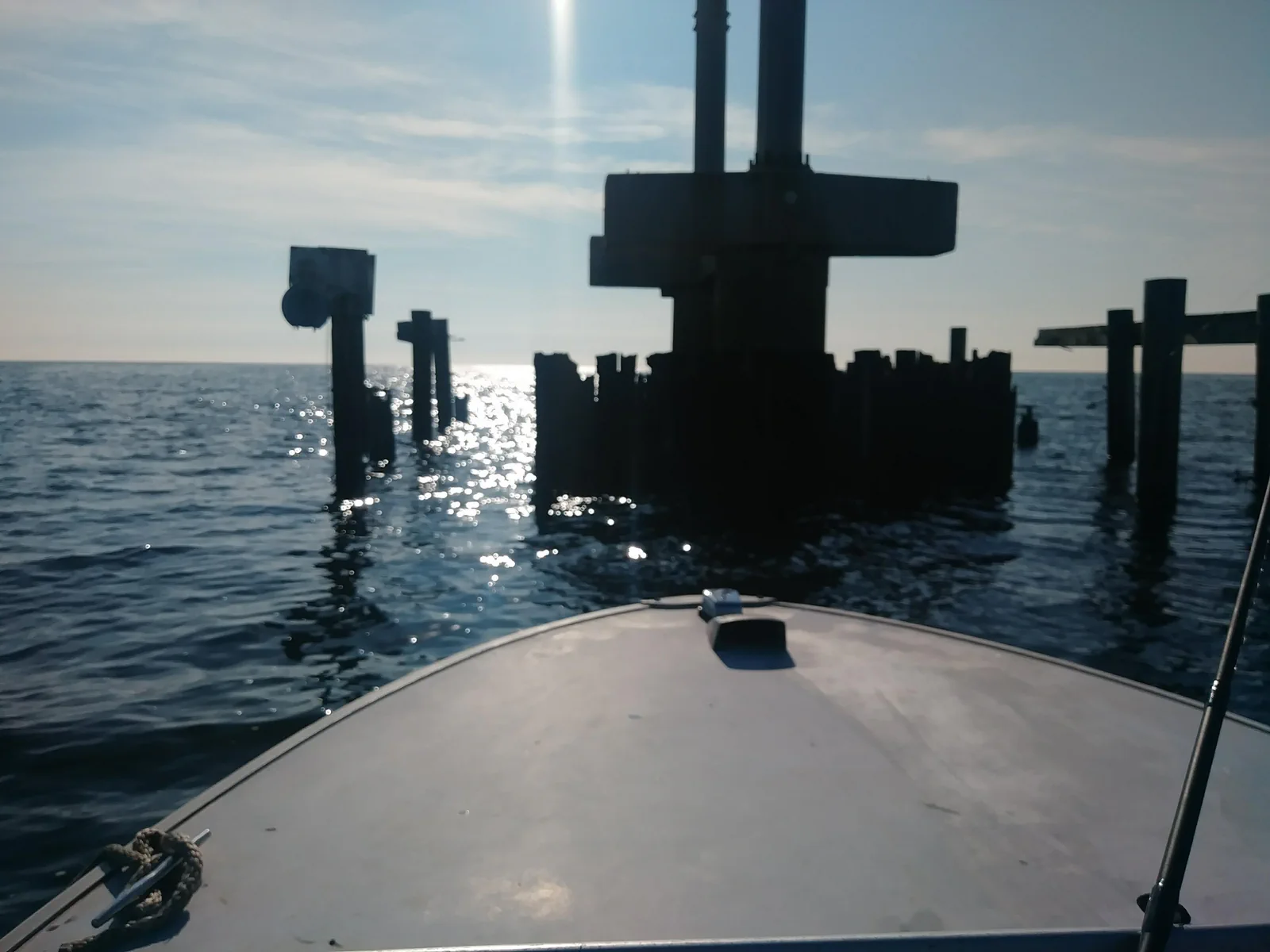 Shade and piling structure along open Southeast Louisiana water